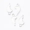 Silver vintage zinc alloy wing charms for DIY jewelry making in a set of four - Bright Silver
