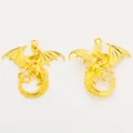 Detailed view of two golden flying dragon pendants for DIY jewelry making accessories - Gold
