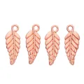 Detail showing four rose gold alloy leaf pendants with clear vein patterns for DIY jewelry - Rose Gold
