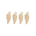 Macro detail of four gold leaf-shaped metal pendants with textured veins and top hanging loops - KC Gold