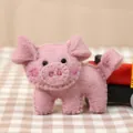 Handmade pink wool felt pig brooch with cute beaded eyes and a fluffy texture - Pink Pig Brooch (One)