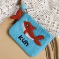 Blue handmade wool felt coin purse with whale embroidery and small pompom detail - Blue