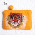 Detail of handmade wool felt coin purse featuring a 3D orange tiger face design - 3D Tiger Head Handmade Felt Coin Purse (3#)