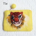 Detailed close-up of wool felt tiger coin purse with a yellow pom-pom zipper pull - 3D Tiger Head Handmade Felt Coin Purse (11#)