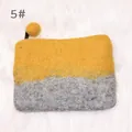Felt coin purse with mustard yellow and dark grey patchwork design and a soft pompom - Yellow/Grey