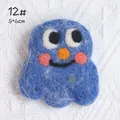 Blue felt Cookie Monster brooch with large eyes and orange nose for clothing - 12# Little Monster