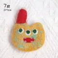 Handmade yellow three-eyed monster wool felt brooch with red horn and green spots - Yellow Red Hat