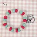 Handmade wool felt ball keychain strap with red, cyan, and cream beads in a soft round design - 10mm Felt Beads / Red/Teal/Cream (9#)