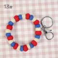 Handmade wool felt ball keychain wristlet in red, blue, and beige with metal clasp - 10mm Felt Beads / Red/Blue/Cream (13#)