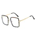 Lunettes carrées vintage en écaille avec branches en métal doré et embouts sombres chic - Monture Noire Léopard