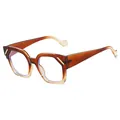Lunettes de soleil cat-eye géométriques avec monture dégradée ambre et accents dorés - Monture Marron Dégradé Verres Transparents