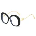 Fashion oval sunglasses with black wavy frame and gold double-heart metal temples - Black Frame Clear Lens