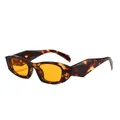 Lunettes de soleil œil-de-chat rétro avec monture écaille et verres teintés orange - Monture Écaille Verres Jaunes
