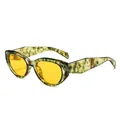 Polygonal cat-eye sunglasses with green marble frame and yellow lenses, front view - Green Pattern Frame Yellow Lens