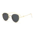 Vintage round metal sunglasses with gold frames and dark lenses in a 45-degree view - Gold Frame Grey Lens