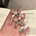 Chic pink satin bow hair clips with sparkling rhinestone centers and silver duckbill clips - Pink