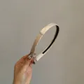 Elegant beige satin headband with sparkling rhinestones and anti-slip lining - White