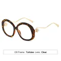 Gafas retro con montura redonda de carey, patillas doradas onduladas y detalle perla - Montura Carey Lentes Transparentes (C9)