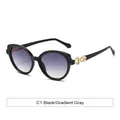 Moderne Cat-Eye-Sonnenbrille für Damen in Schwarz mit grauen Verlaufsgläsern - Schwarzer Rahmen Verlauf Grau