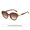 Klassische Cat-Eye Sonnenbrille in Schildpatt-Optik mit braunem Verlauf und Metalldetail - Schildpatt Rahmen Verlauf Braun