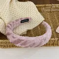 Pink velvet sponge headband with lace trim and handmade label on woven background - Pink Gingham