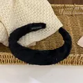 Detail view of handmade black textured sponge headband with lace effect and handmade label - Black Plaid