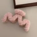 Pink plush wave claw clip with soft faux fur texture for women's autumn winter hairstyles - Plush Pink