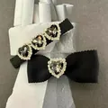 Barrette à cheveux noire élégante avec strass en forme de cœur et nœud raffiné - Ensemble de Pinces à Cheveux Cœur / Noir