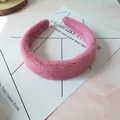 Close-up of soft plush pink sponge headband showing fuzzy texture and thick padded style - Rose Red