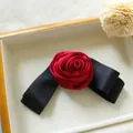Elegante fermaglio per capelli con rosa di raso rosso e fiocco nero in scatola regalo - Fiocco di Rosa Amaranto