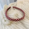 Detail of handmade tweed headband with woven texture and premium handmade label - Tweed Red