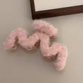 Pink plush wave-shaped shark hair claw clip for women featuring soft fuzzy texture - Plush Pink