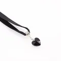 Elegant black velvet choker necklace featuring a faceted heart-shaped crystal pendant - Black