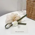 Elegant cream organza scrunchie with dark green ribbon and white camellia flower - White Camellia Style / Cream