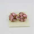 Fashionable pink ceramic flower stud earrings with yellow rhinestones on display card - Pink