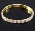 Bracelet de cheville extensible à trois rangées de strass dorés avec reflet brillant - Or