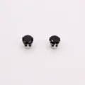 Detail showing classic round black zircon stud earrings with silver six-prong setting - Black Magnetic Style / Black