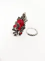 Detail of vintage silver ring set with large red gemstone and crystal butterfly motif - US 6 / Red