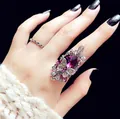 Two-piece silver ring set featuring a vintage purple crystal butterfly and wave band - US 6 / Purple