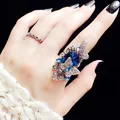 Vintage silver-plated ring set featuring a large deep blue crystal and butterfly design - US 6 / Blue