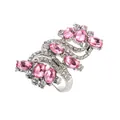 Detailed view of silver S-shape ring featuring pink crystals and white pave zircons - Pink