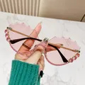Pink rimless oversized sunglasses with wavy rhinestone edges and gold metal temples - Pink Rhinestone Pink Lens