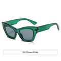 Cat eye sunglasses featuring transparent green frames and gray lenses in a retro design - Green Frame Grey Lens
