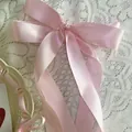 Elegant light pink satin ribbon hair bow with long tails in balletcore style for women - Hair Clip / Light Pink