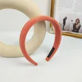 Padded coral sponge headband with soft velvet texture and handmade label detail - Orange