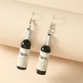 Creative miniature red wine bottle drop earrings with realistic labels and silver neck - Cabernet Sauvignon (2006 Vintage) / Black