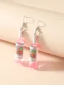Close-up of pink translucent wine bottle earrings with glitter caps and silver hooks - Olympic Cellars Winery Label / Pink