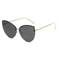 Chic oversized cat-eye sunglasses with gold metal frames and dark lenses for women - Gold Frame/Grey Lens