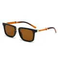 Square fashion sunglasses with black frame, amber lenses and gold metal temple detail - C7