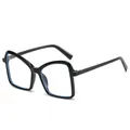 Occhiali da sole squadrati oversize con montatura nera e riflessi blu di tendenza - Lente Piana / Montatura Nera Lenti Trasparenti